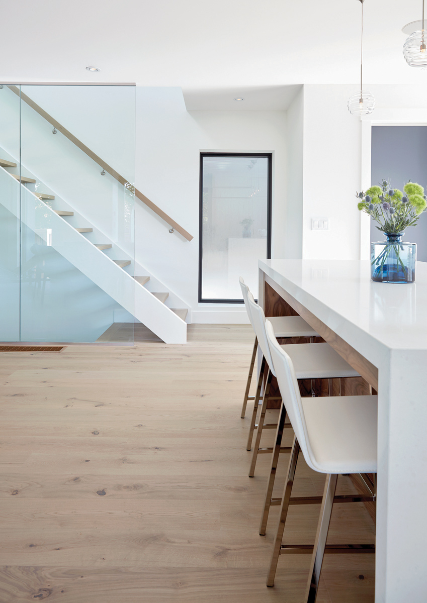 East York: Features included the use of Pizzara black slate, glass mosaic tile and Caesarstone