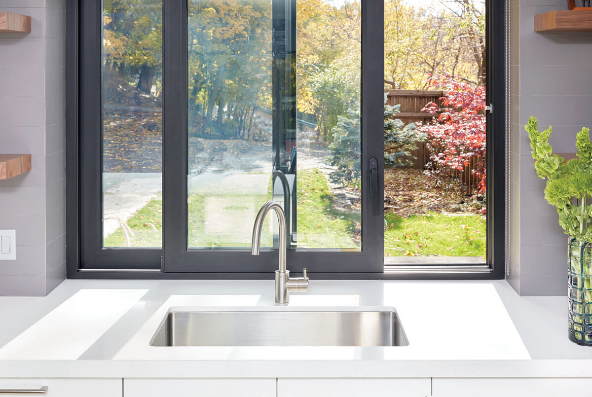 East York: Oiled oak flooring was paired with walnut accents and glass to allow for maximum warmth and light