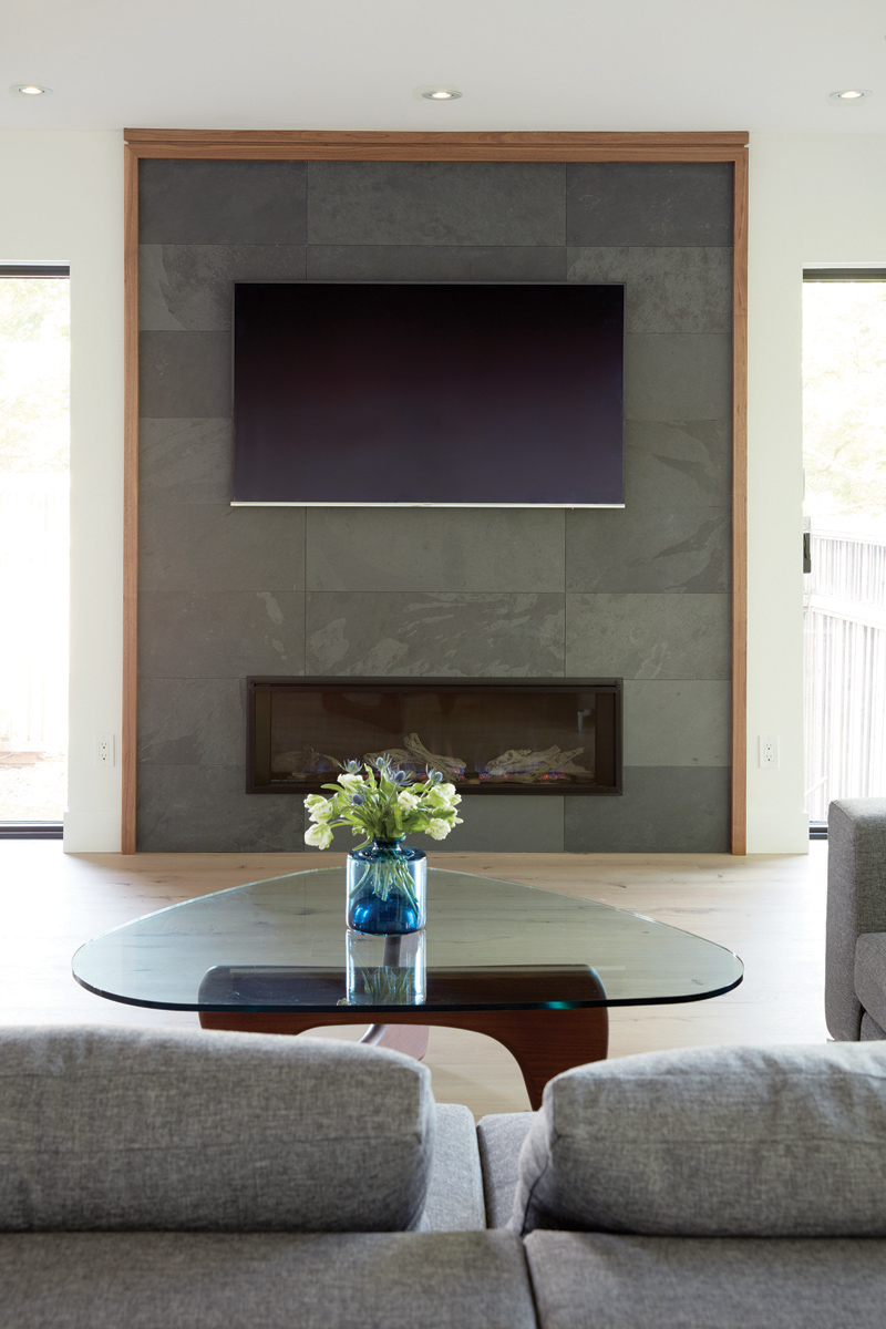 East York: The focus of this project was on bringing the outdoors in, with an extensive window package that allowed for views of the forested lot from all rooms and space for a collection of carefully curated art pieces