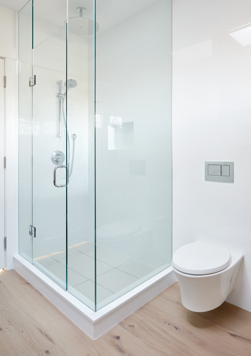 East York: Features included the use of Pizzara black slate, glass mosaic tile and Caesarstone