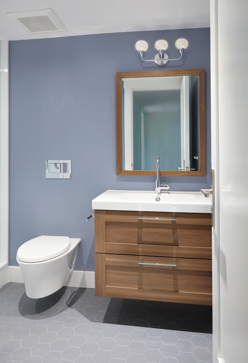 East York: Features included the use of Pizzara black slate, glass mosaic tile and Caesarstone