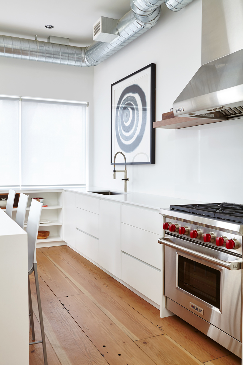 Urban Living Space: Of special note, reclaimed fir joists from the demolition were turned into stunning 11” solid fir flooring, adding character throughout