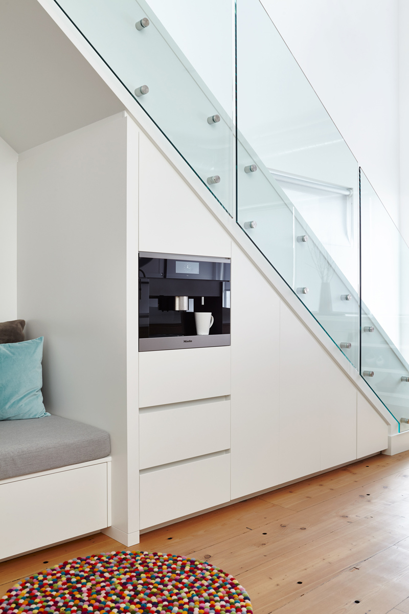 Urban Living Space: The completed space has over 2800 square feet and includes two bedrooms on the lower floor and a master with ensuite on the second, a 600 square foot rooftop deck and a bright and airy main floor with kitchen and great room