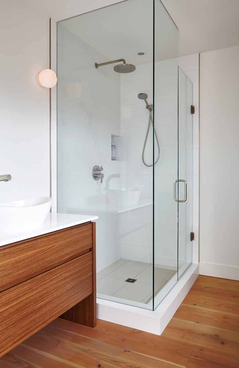 Urban Living Space: Special focus on spaces for art to hang in a gallery like setting, custom built-in storage where you might least expect it and the installation of an aluminum curtain wall window system