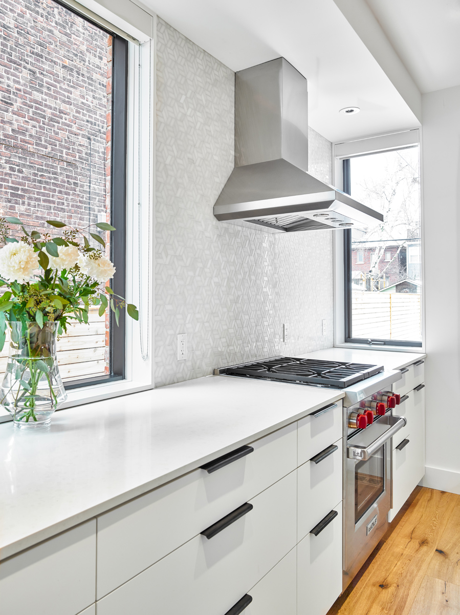Roncesvalles Reno: Another standout is the custom lasercut screen features a pattern inspired by the kitchen backsplash tile