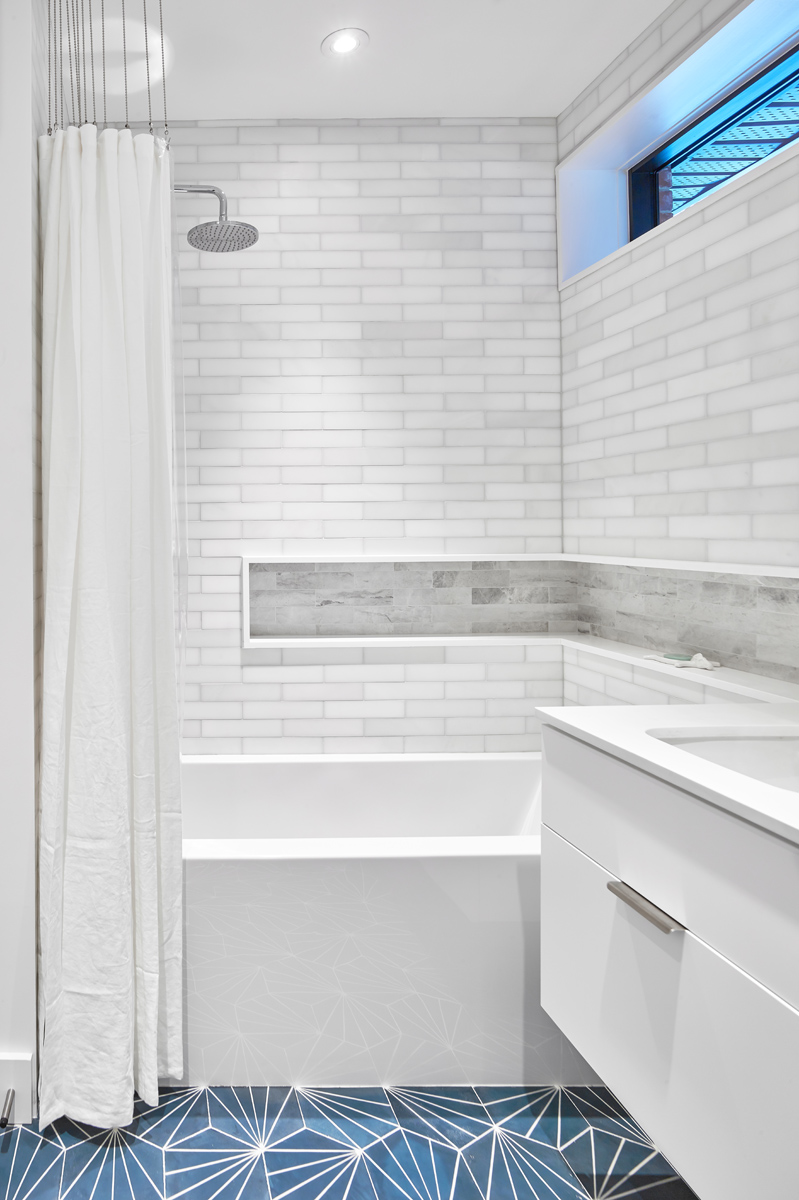 Roncesvalles Reno: Textures like exposed beams and geometric wild tiles give this home cool-kid elevation