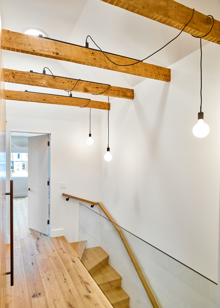 Roncesvalles Reno: The front of the house is reimagined with a fresh, new facade with a reimagined front porch and entrance