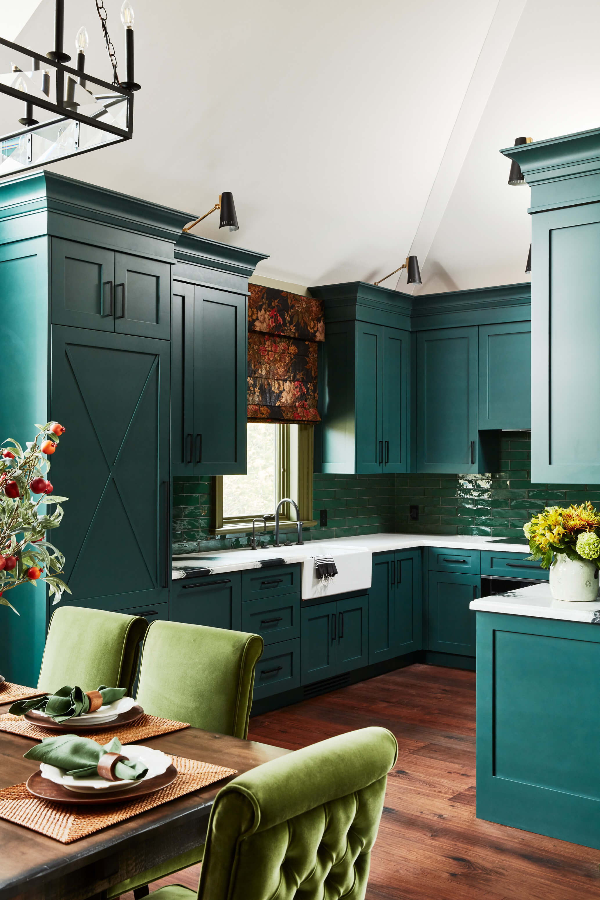 Country Retreat: Antlers, antique framed mirrors and plaid trim accentuates the high ceilings