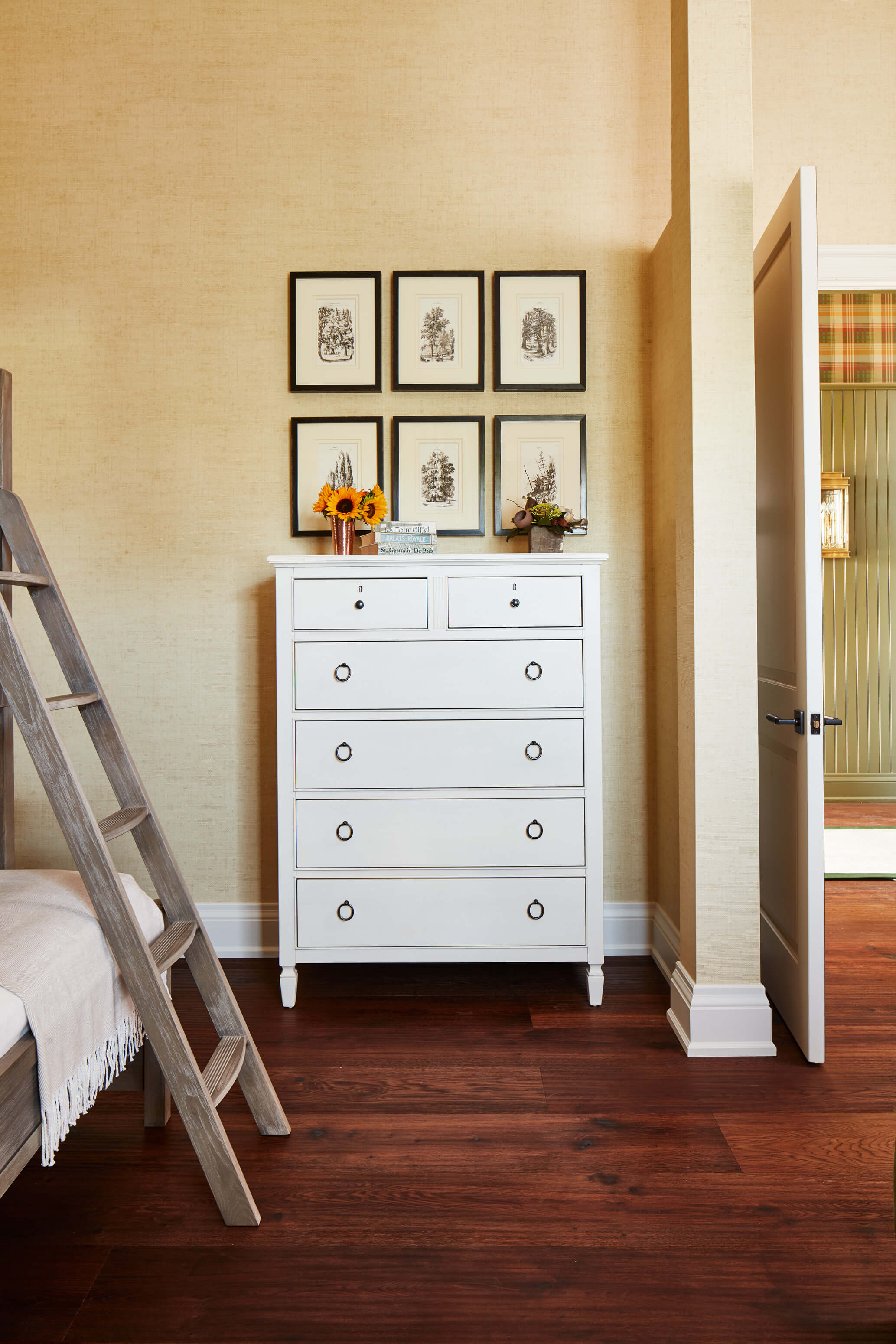 Country Retreat: The palette of subdued greens, sunny yellows, and watery blues draws inspiration from nature