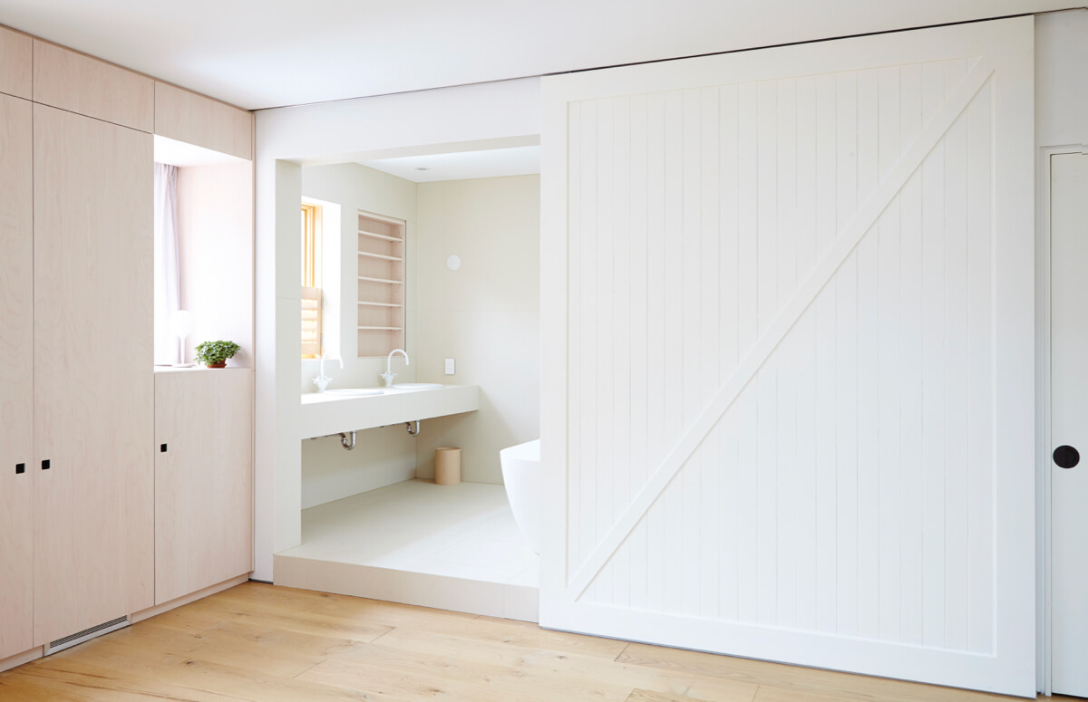 Parkdale Project: Clever use of mosaics and and large format tile from Italy with white powder coated fixtures brought the ensuite vision into being