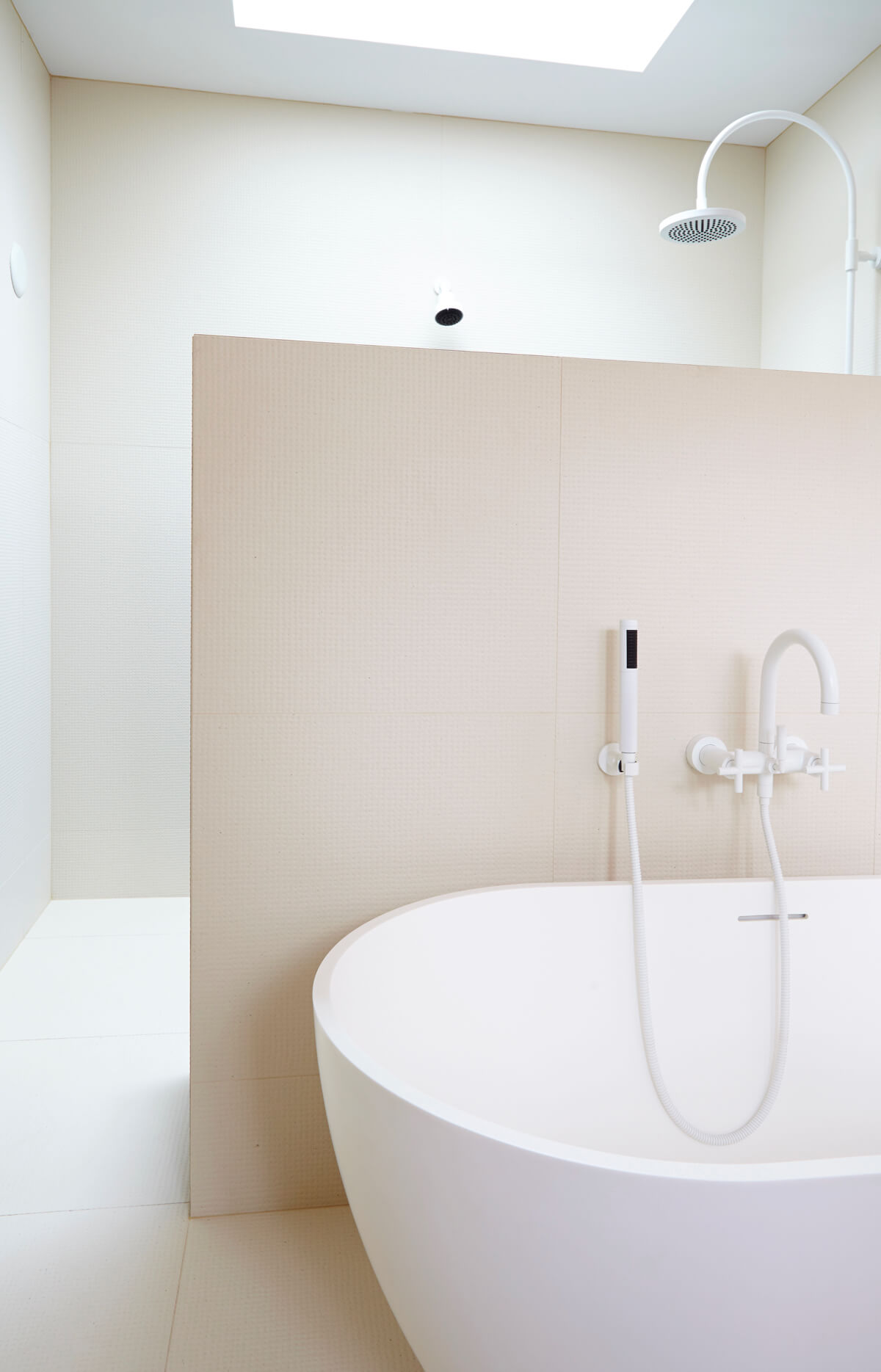 Parkdale Project: Clever use of mosaics and and large format tile from Italy with white powder coated fixtures brought the ensuite vision into being