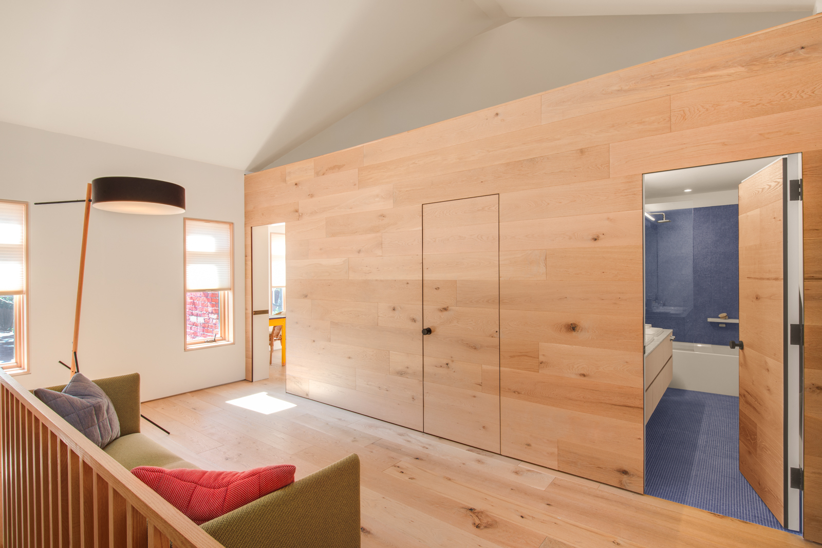 Parkdale Project: Oversized plank flooring and floor to ceiling oak cabinetry complimented the space