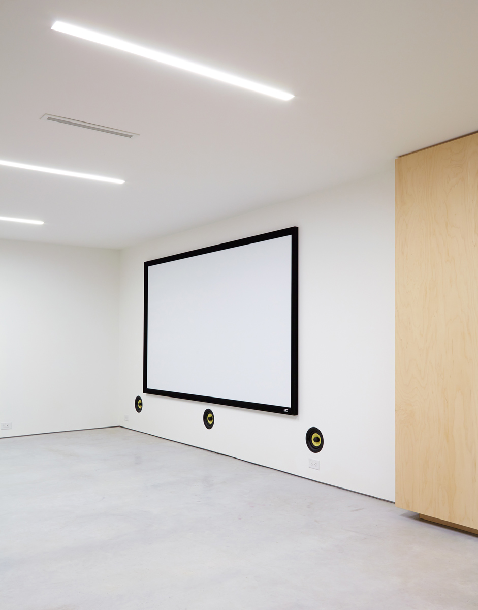 Parkdale Project: Oversized plank flooring and floor to ceiling oak cabinetry complimented the space