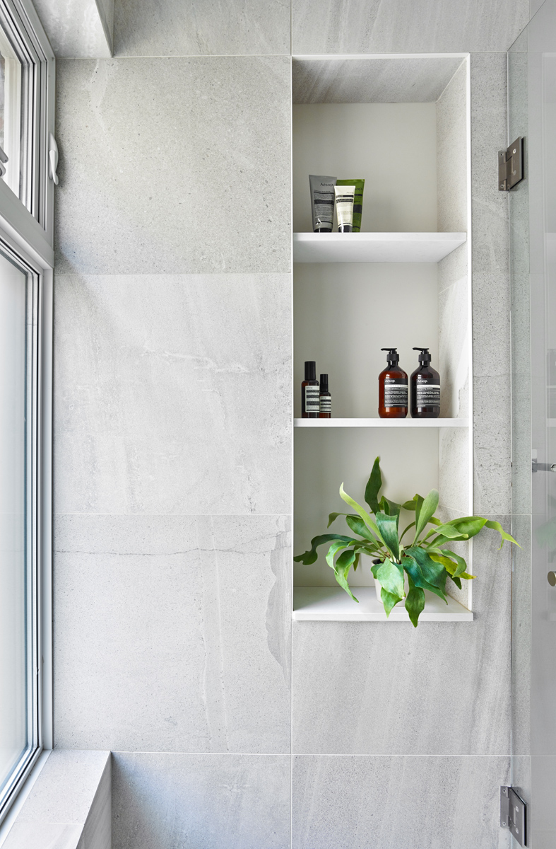 Awe-Inspiring Annex: The front foyer offers generous amounts of closet space and an inset bench by the front door that provides space for shoe storage