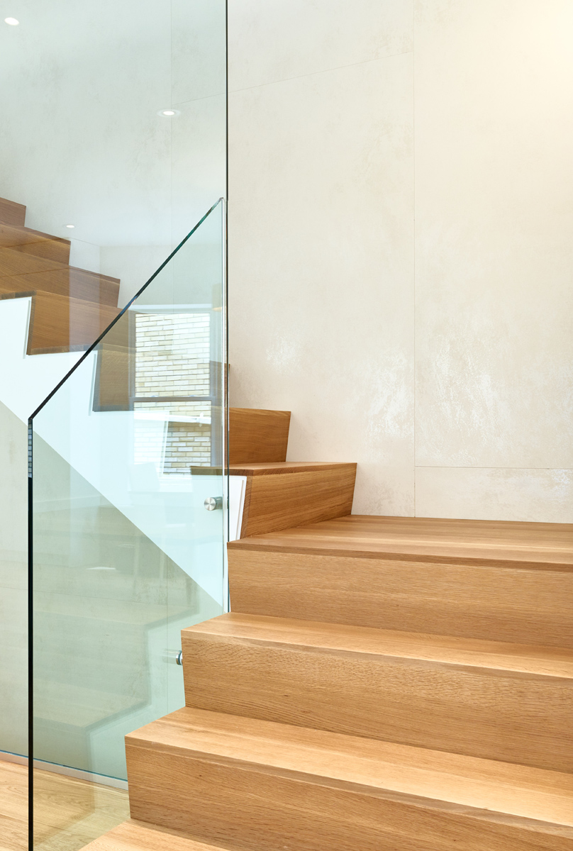 Awe-Inspiring Annex: The front foyer offers generous amounts of closet space and an inset bench by the front door that provides space for shoe storage