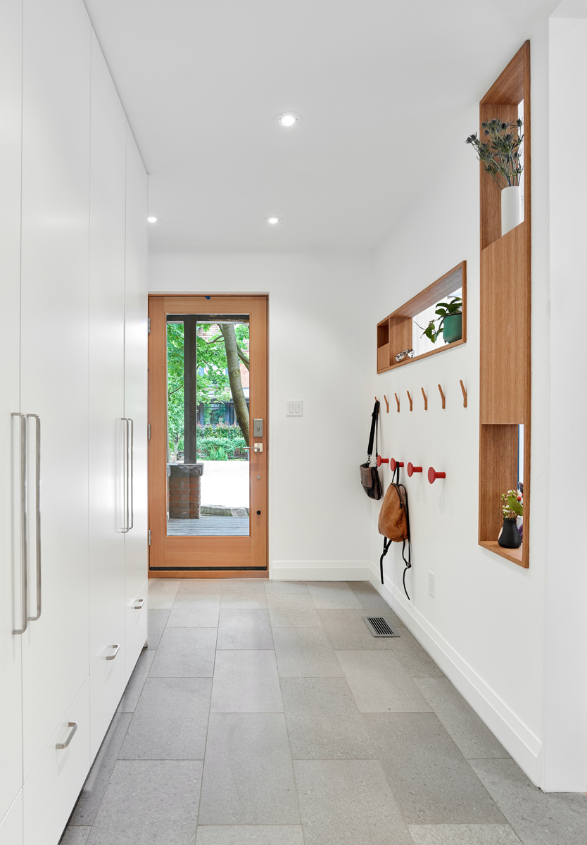 Awe-Inspiring Annex: The main living room at the front of the house is bright and airy, centred around a wood-burning fireplace and a floating media/TV unit