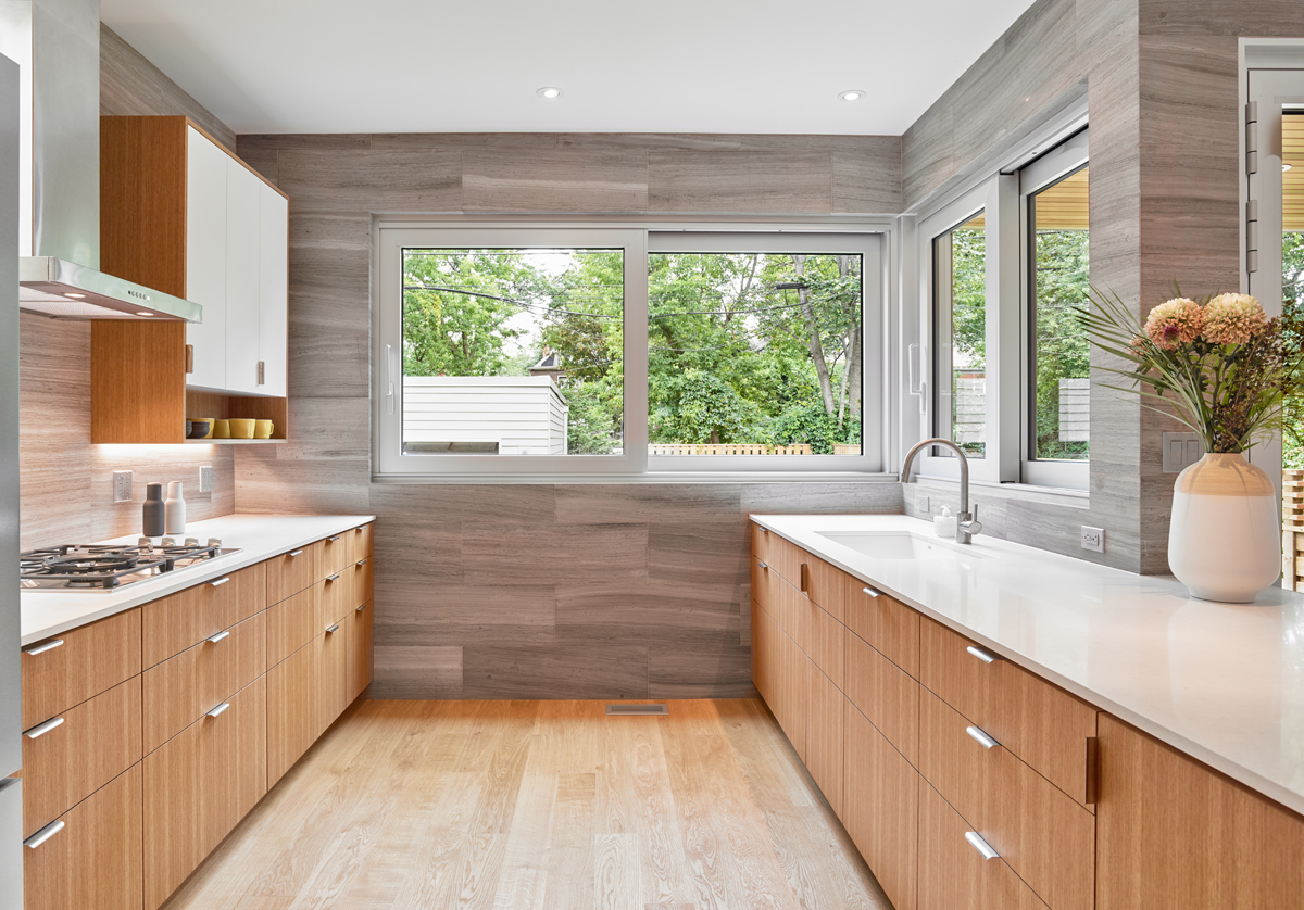 Awe-Inspiring Annex: The front foyer offers generous amounts of closet space and an inset bench by the front door that provides space for shoe storage