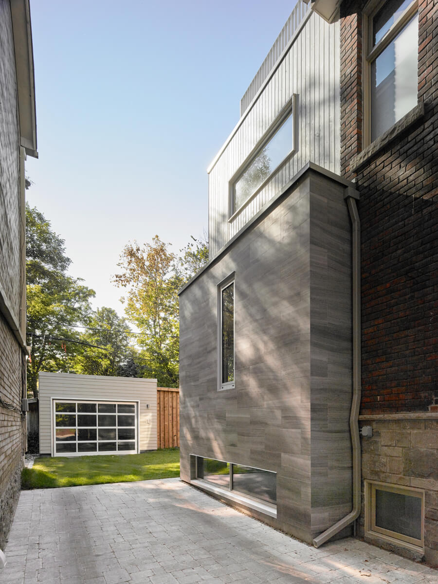 Awe-Inspiring Annex: The interior of the Edwardian-era home is given a modern palette and modern touches like generous closet space and a sleek, compact powder room