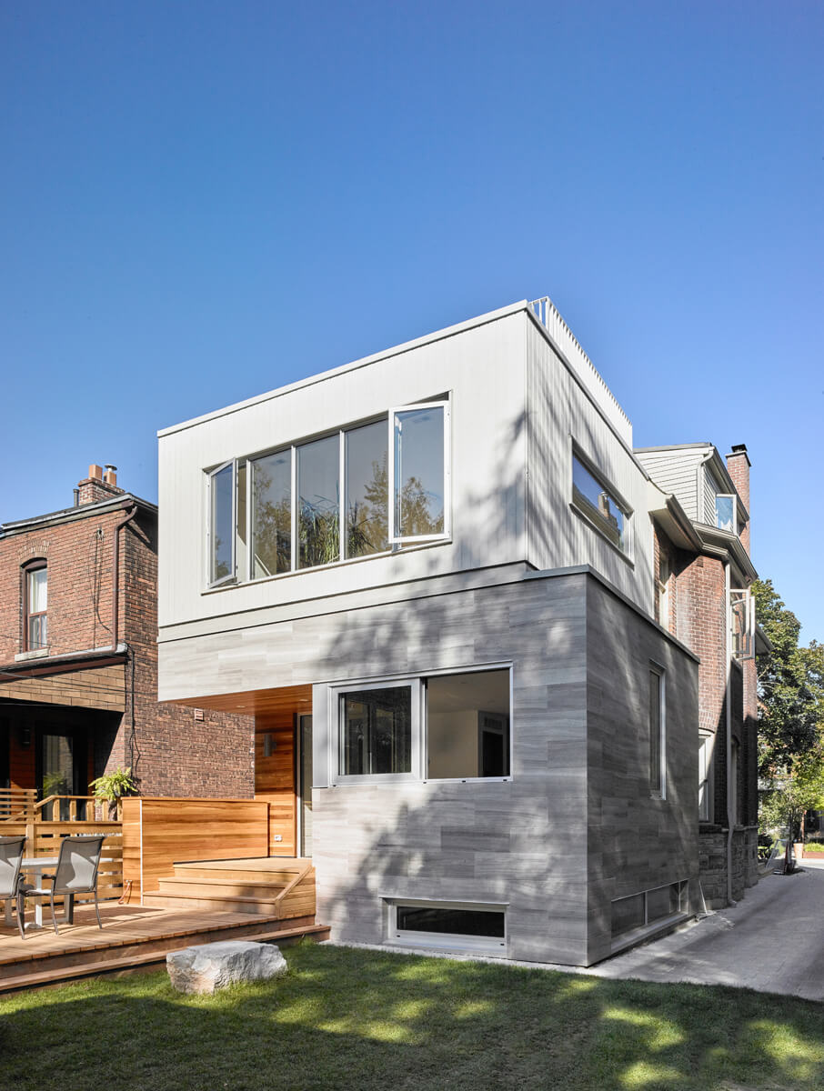 Awe-Inspiring Annex: The main living room at the front of the house is bright and airy, centred around a wood-burning fireplace and a floating media/TV unit