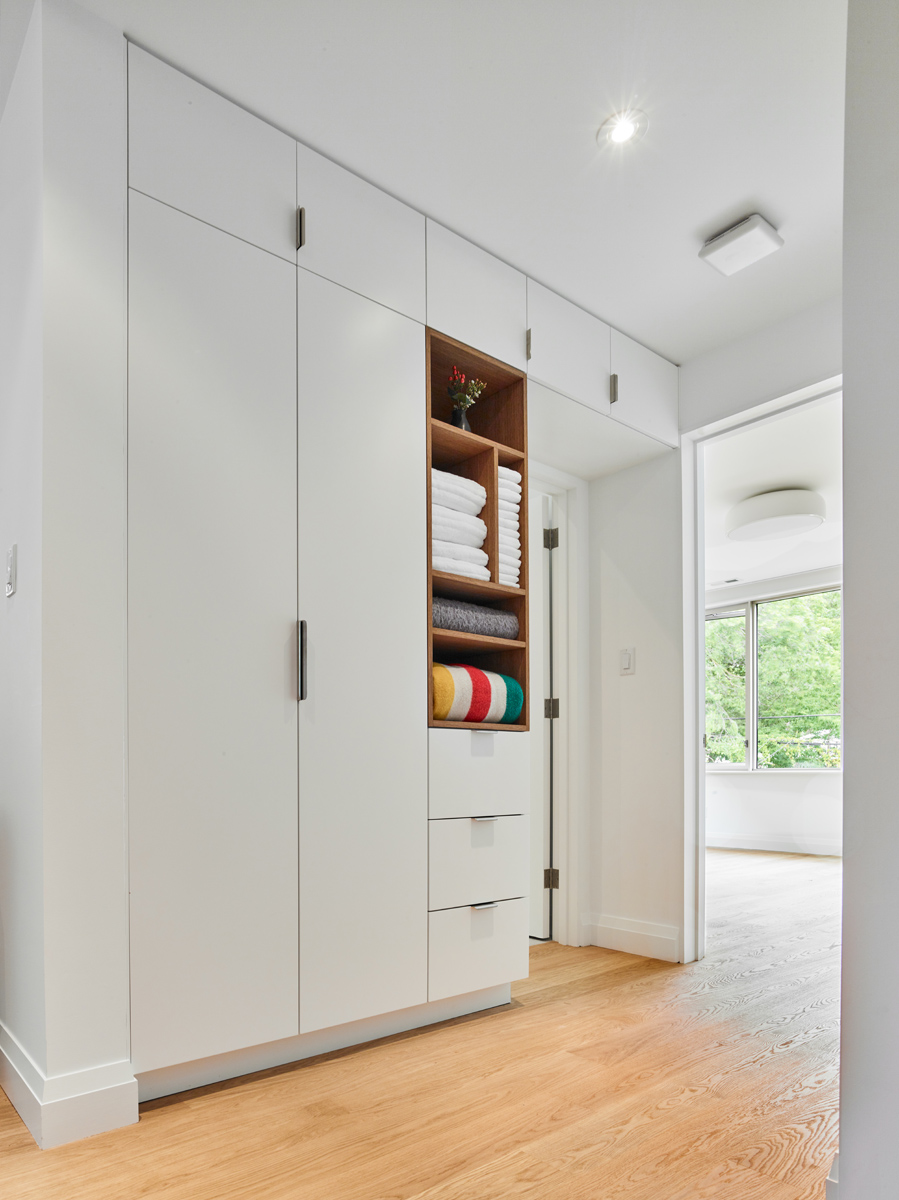 Awe-Inspiring Annex: Open shelves that allow visitors a sneak peak into the living space beyond
