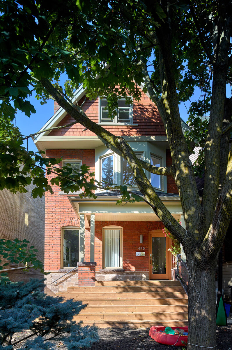 Awe-Inspiring Annex: The front foyer offers generous amounts of closet space and an inset bench by the front door that provides space for shoe storage