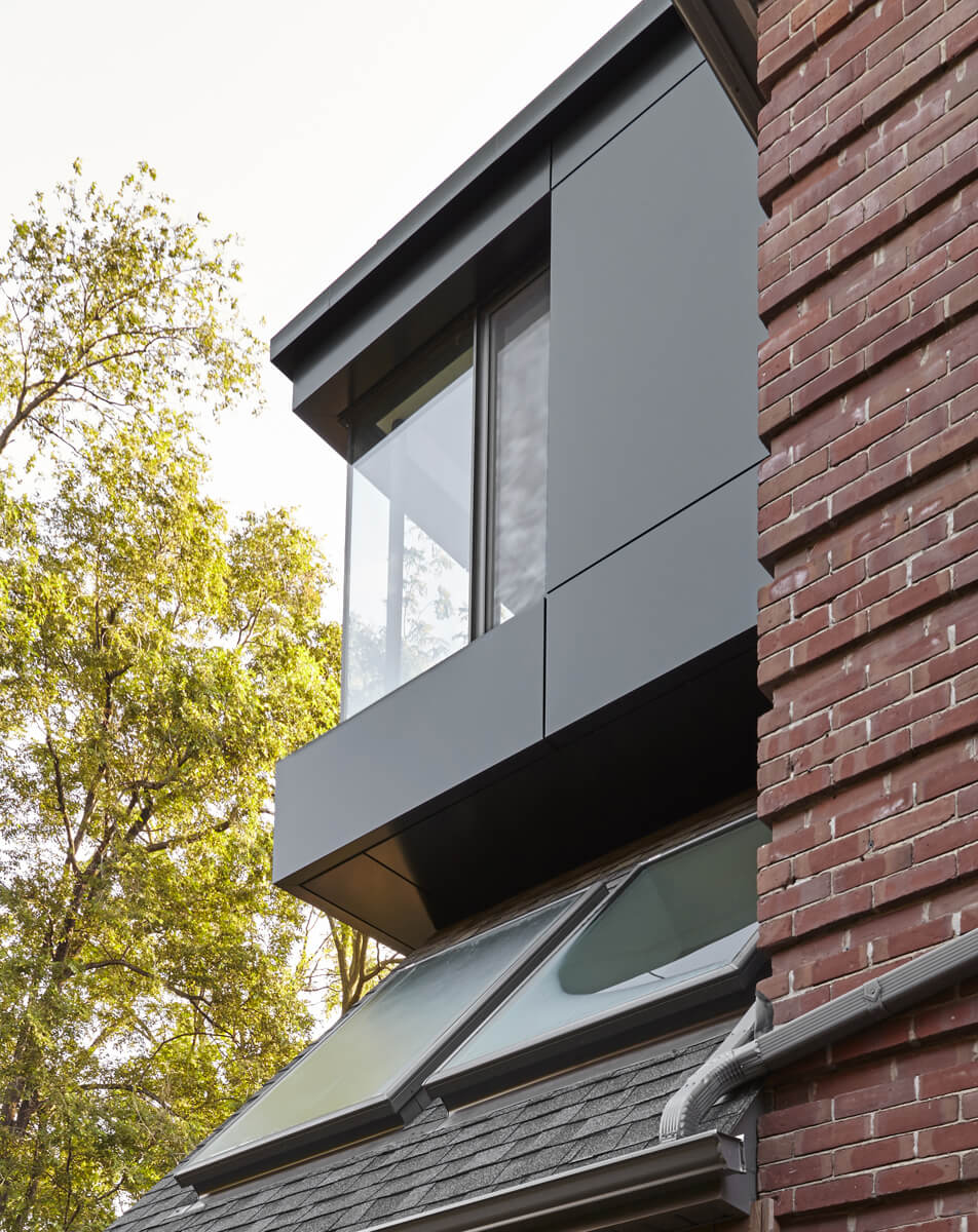 Summerhill Standout: The front half remained traditional while the back of the home was completely opened up and styled in a very modern aesthetic complete with huge windows, oversized skylights, custom exterior metal panels, and natural thermally…