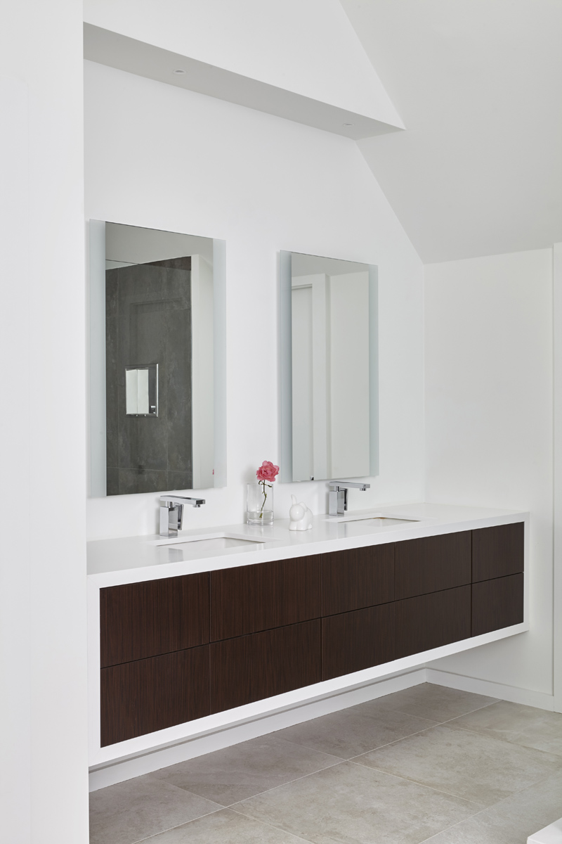 Summerhill Standout: The front half remained traditional while the back of the home was completely opened up and styled in a very modern aesthetic complete with huge windows, oversized skylights, custom exterior metal panels, and natural thermally…