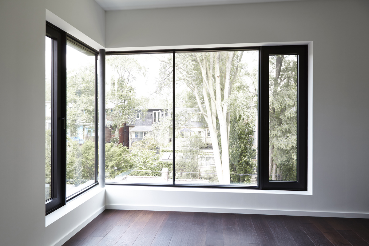 Summerhill Standout: The front half remained traditional while the back of the home was completely opened up and styled in a very modern aesthetic complete with huge windows, oversized skylights, custom exterior metal panels, and natural thermally…