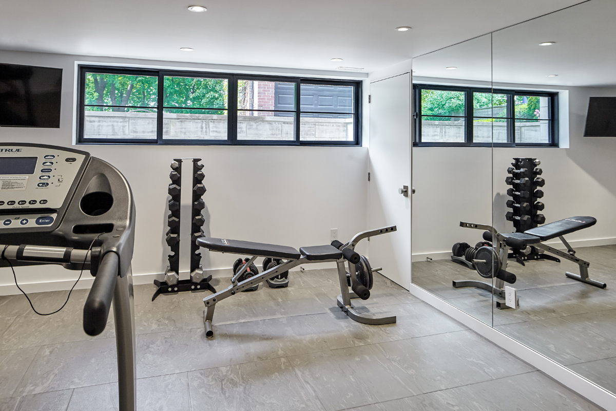 Beautiful Baby Point: The rear 2-storey addition is blended seamlessly with the existing home, revealing a new master suite bedroom and sleek ensuite with bold blue tiling
