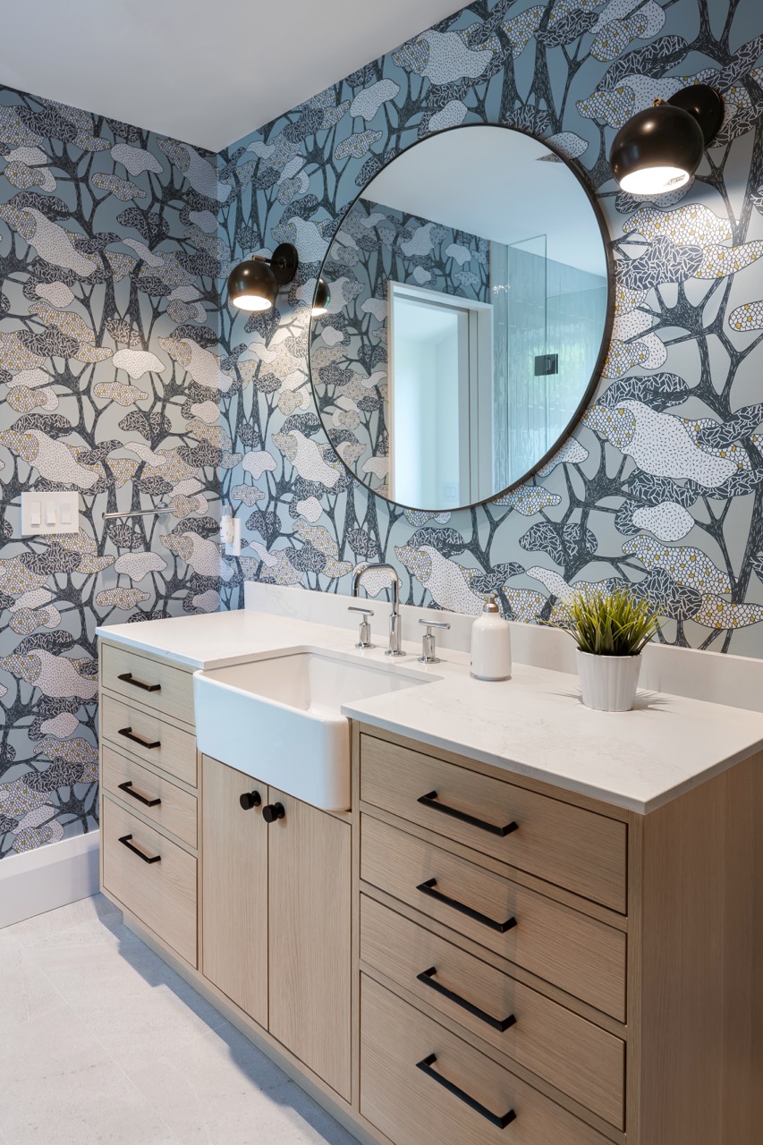 Rusholme Restored: This Rusholme home was reworked around one big, light-filled great room, where a whitewashed brick fireplace and full-height oak built-ins frame a media wall, and steel-framed glass doors fold open to the backyard