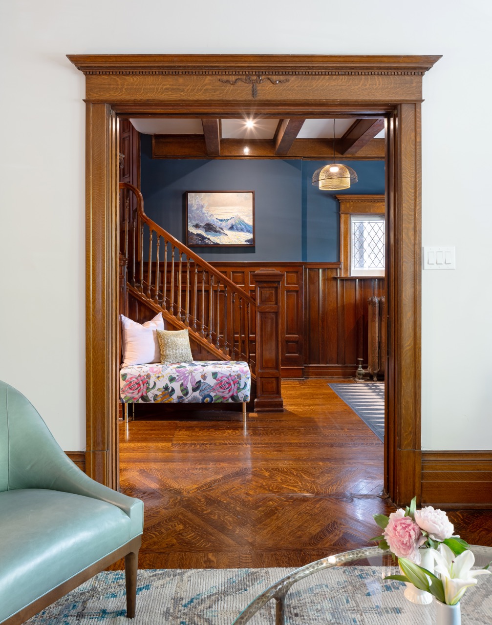 Rusholme Restored: This Rusholme home was reworked around one big, light-filled great room, where a whitewashed brick fireplace and full-height oak built-ins frame a media wall, and steel-framed glass doors fold open to the backyard