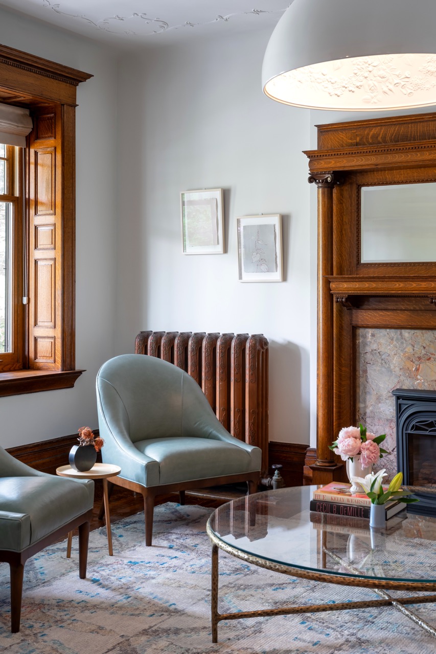 Rusholme Restored: This Rusholme home was reworked around one big, light-filled great room, where a whitewashed brick fireplace and full-height oak built-ins frame a media wall, and steel-framed glass doors fold open to the backyard