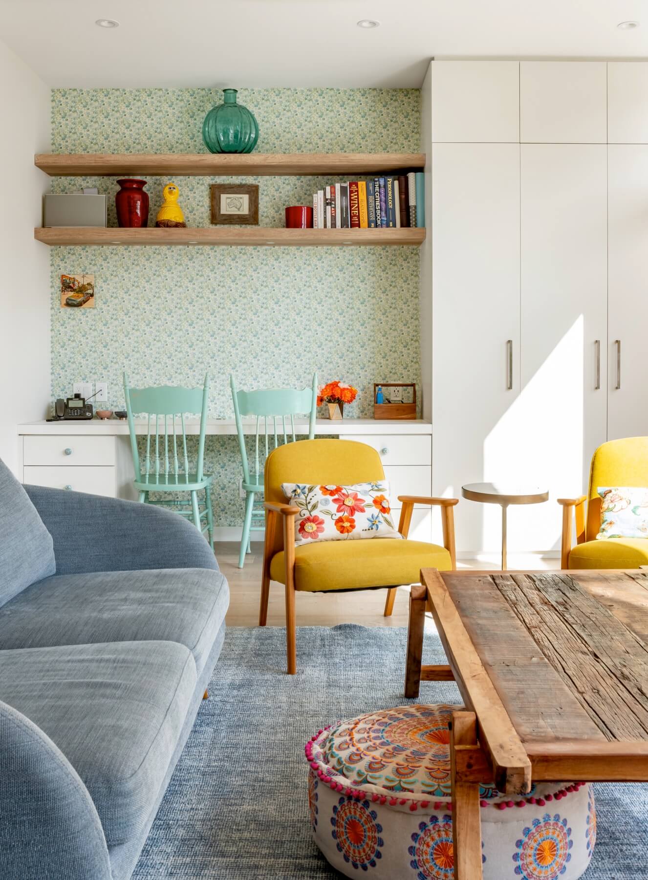 Dufferin Grove: The interior design playfully combines original parts of the home with vintage elements as well as glass and steel and millwork to divide spaces for working, relaxing and entertaining
