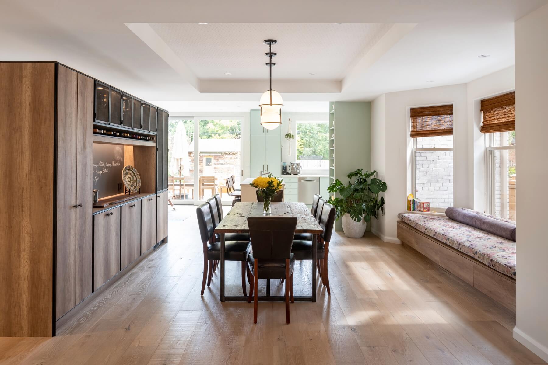 Dufferin Grove: An enormous sliding glass door opens the main floor to the sprawling rear deck and pool/hot tub area seamlessly