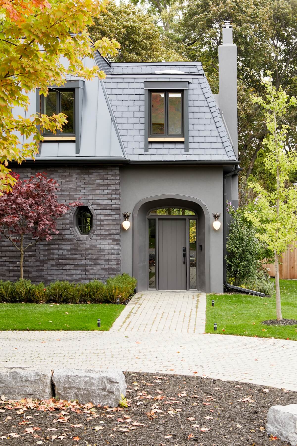 Islington Village: In keeping with the French style, a metal and slate mansard roofline dominates the façade, while inside, an open concept main floor split across three elevations, is punctuated by reclaimed rough hewn fir beams and a herringbone…
