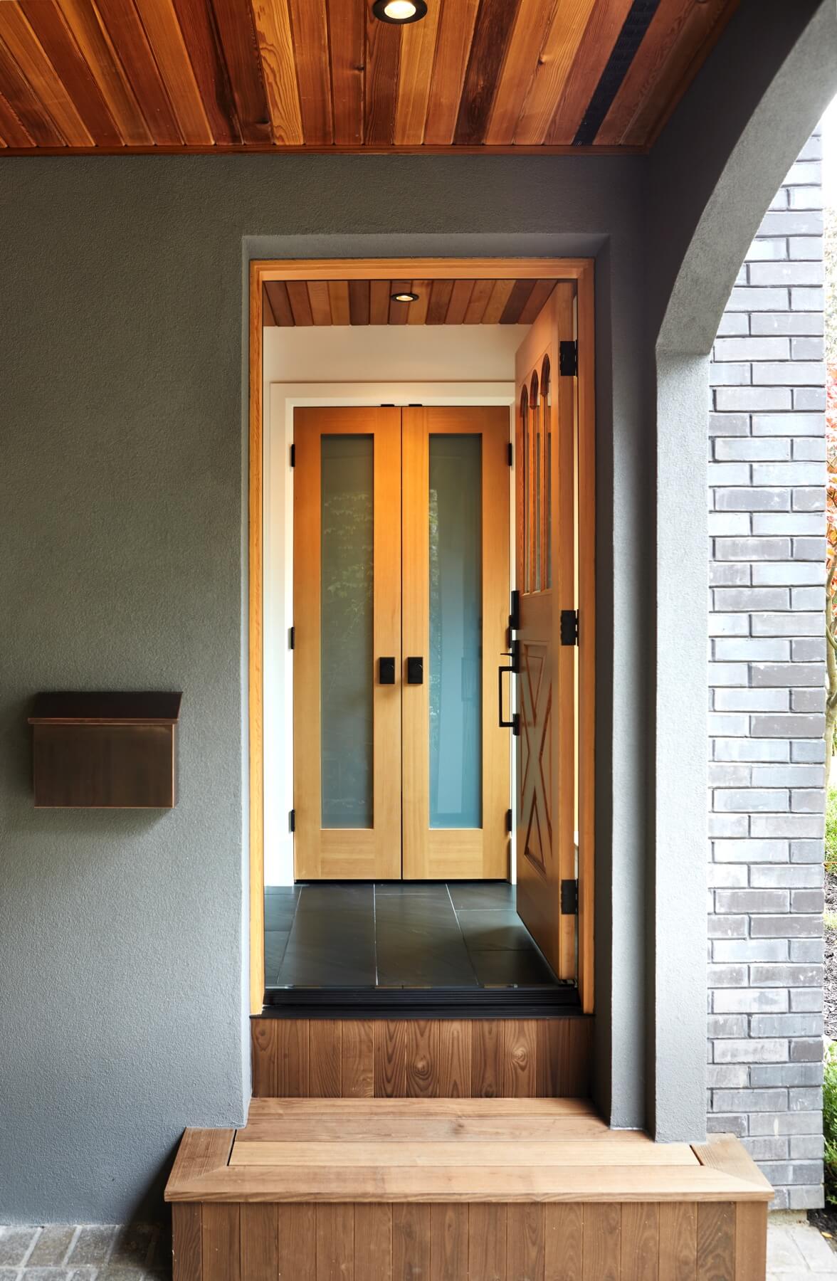 Islington Village: Design elements include the use of three species of wood, warm metals, various marbles, bespoke lighting fixtures and Canadian art as a focal point within each space