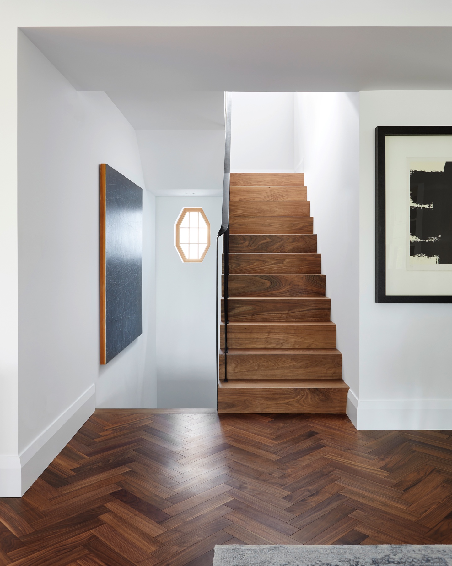 Islington Village: The elegant kitchen includes Calacatta marble countertops, Wolf range, SubZero glass paned refrigerator, open walnut shelving, blue/black cabinetry with hand forged bronze hardware and a larder with a SubZero freezer, wine fridge…