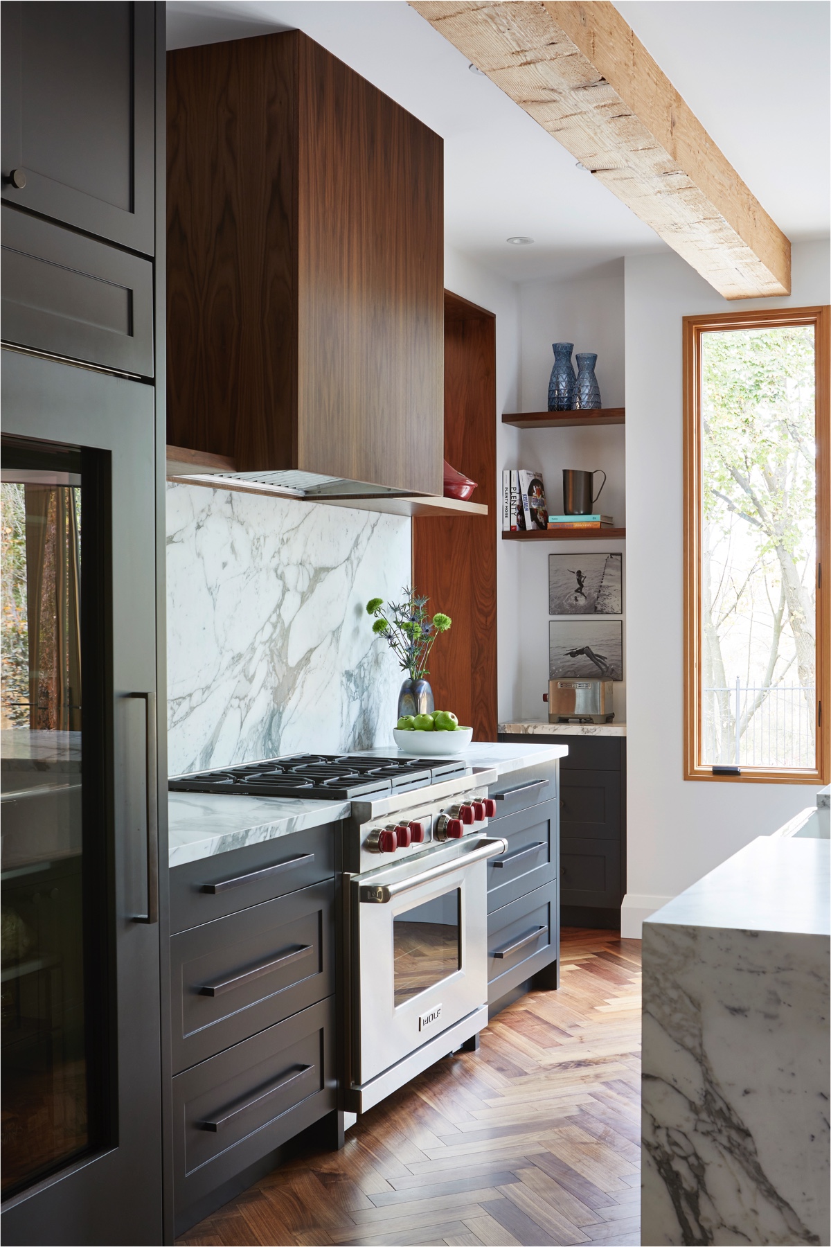 Islington Village: The emphasis on wood detailing continues with Pella fir windows framing a full view of the canopy of trees that hang over the golf course and back of the house