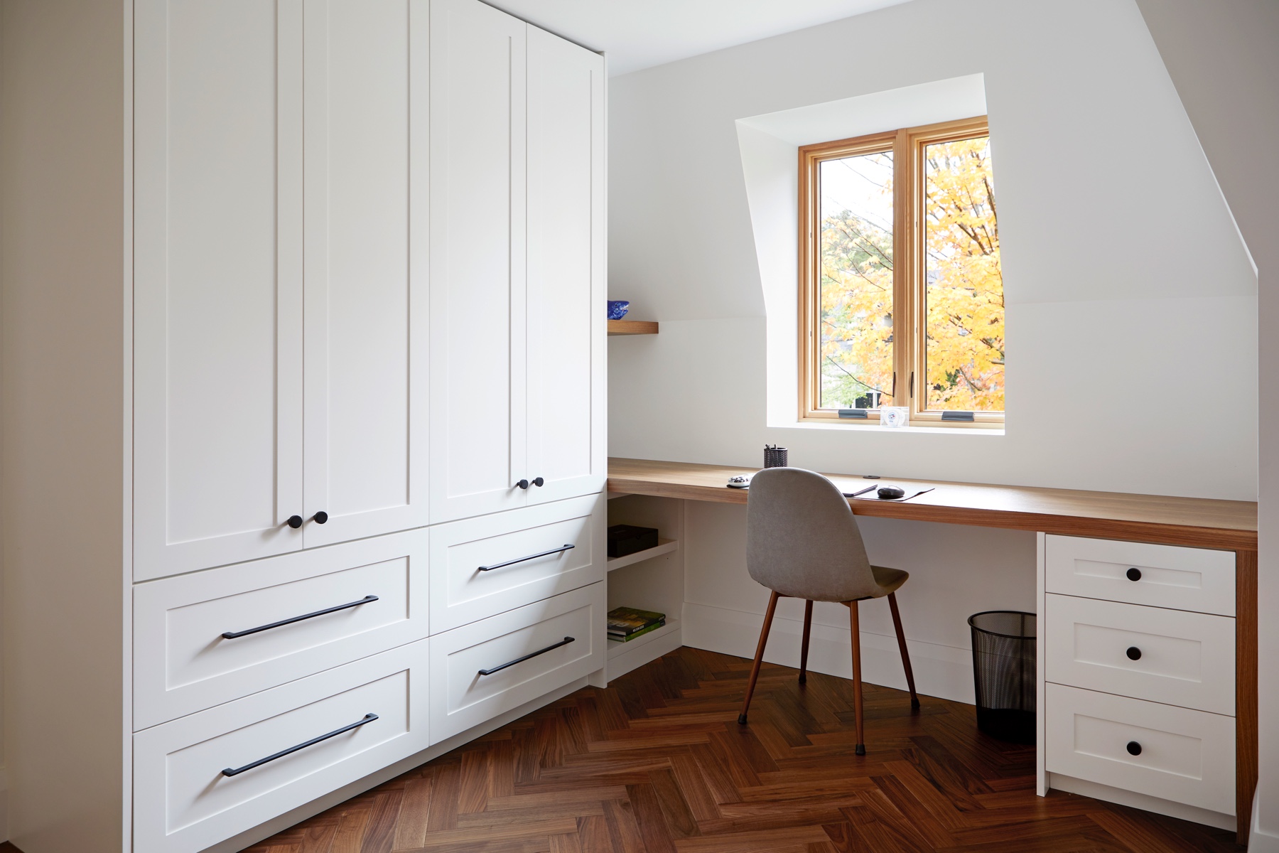 Islington Village: In keeping with the French style, a metal and slate mansard roofline dominates the façade, while inside, an open concept main floor split across three elevations, is punctuated by reclaimed rough hewn fir beams and a herringbone…