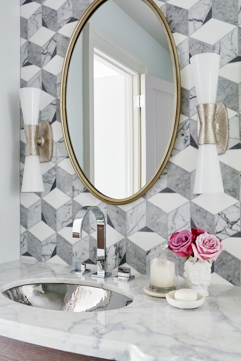 Manor Estate: The anything but understated kitchen makes a whimsical impression, featuring marble counters and backsplashes, cherry blossom mosaic tiling, powder blue custom cabinetry and metallic finishes of silver, brass, copper and rose gold