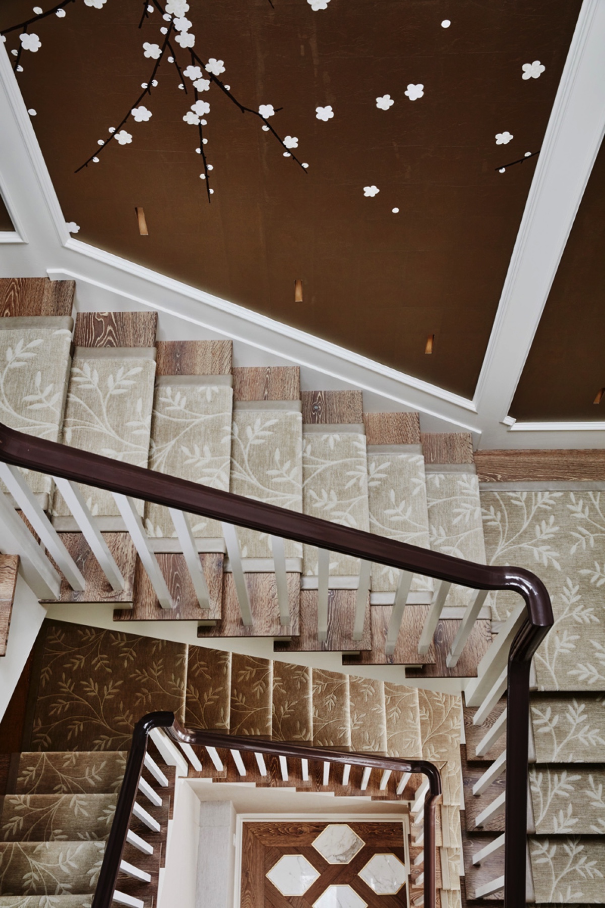 Manor Estate: The opulent first-floor powder room with gold-tiled mosaic mural is a visual feast