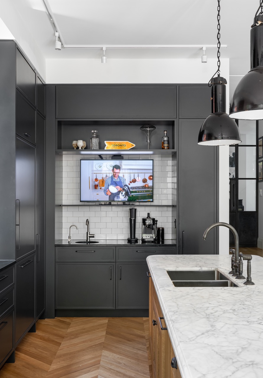 Picturesque Parkside: Black steel-framed glass doors divide the principal rooms without closing them off, and brass flush-mounts add warmth throughout