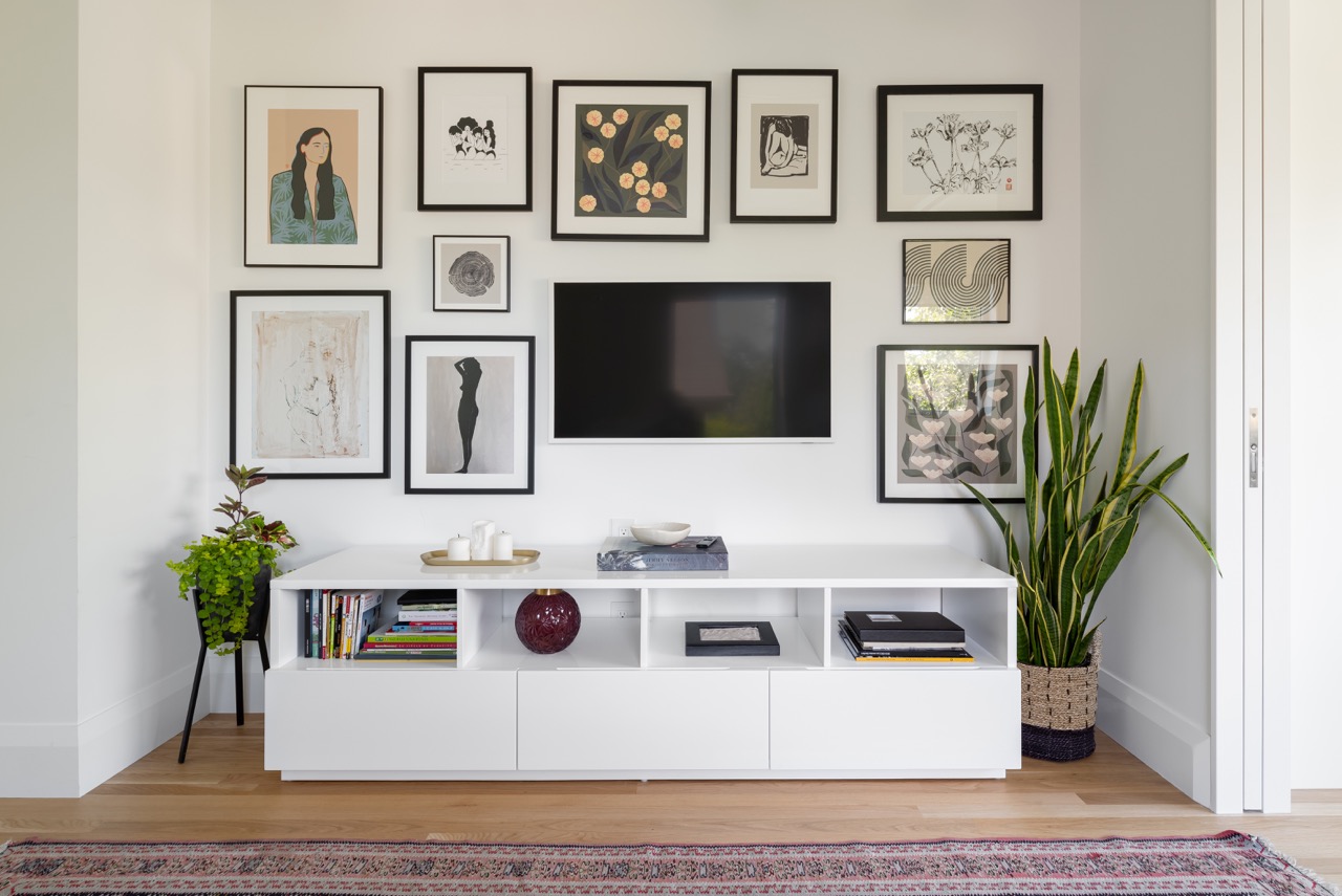 Picturesque Parkside: Black steel-framed glass doors divide the principal rooms without closing them off, and brass flush-mounts add warmth throughout