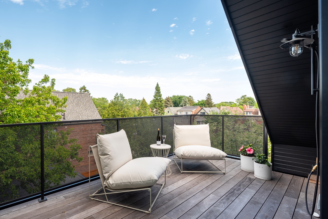 Picturesque Parkside: Black steel-framed glass doors divide the principal rooms without closing them off, and brass flush-mounts add warmth throughout