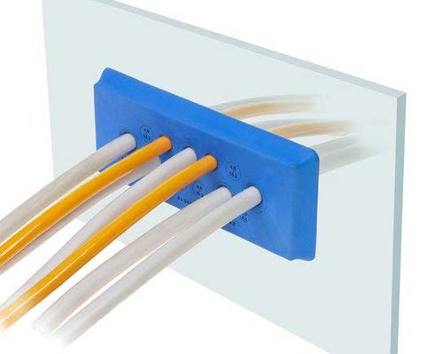 Blue cable entry plate with six white and orange cables running through a transparent plate