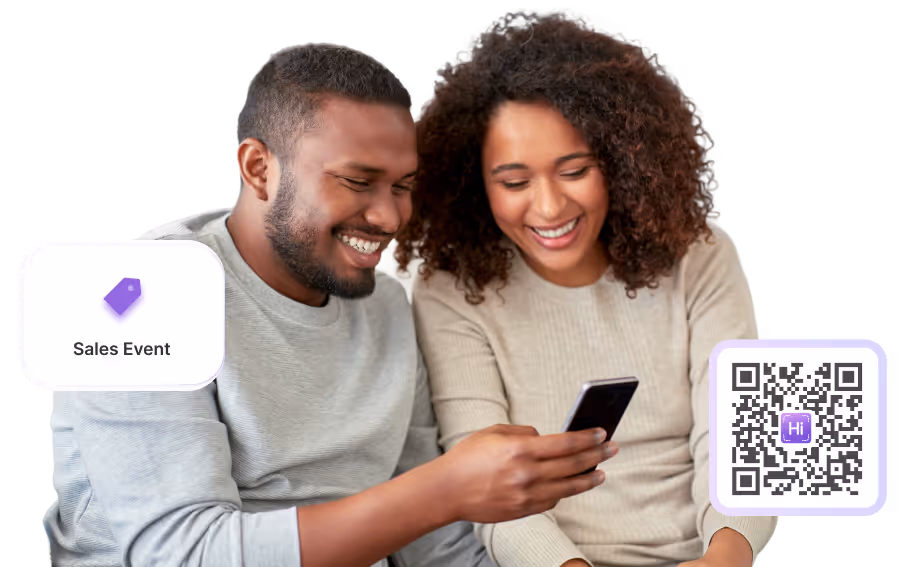 Two professionals at a sales meeting using HiHello to exchange digital business cards.