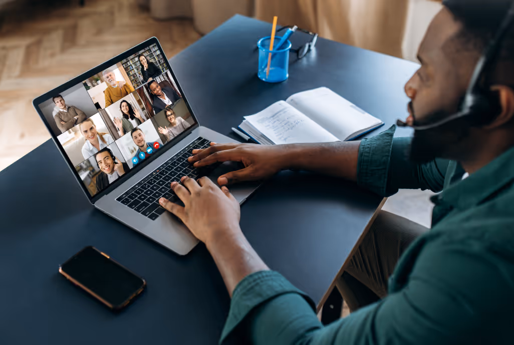 Professional on video call representing distributed sales teams using HiHello