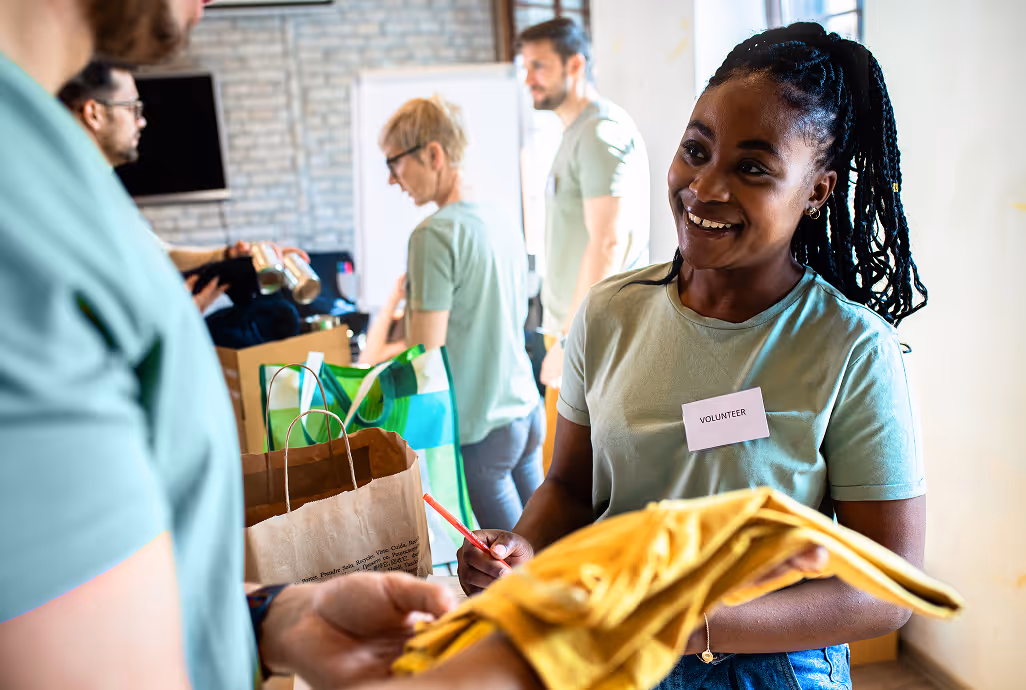 Volunteers organizing donations representing non-profits using HiHello