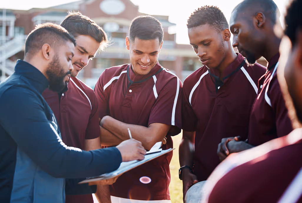 Sports team huddled together representing clubs and groups using HiHello digital business cards