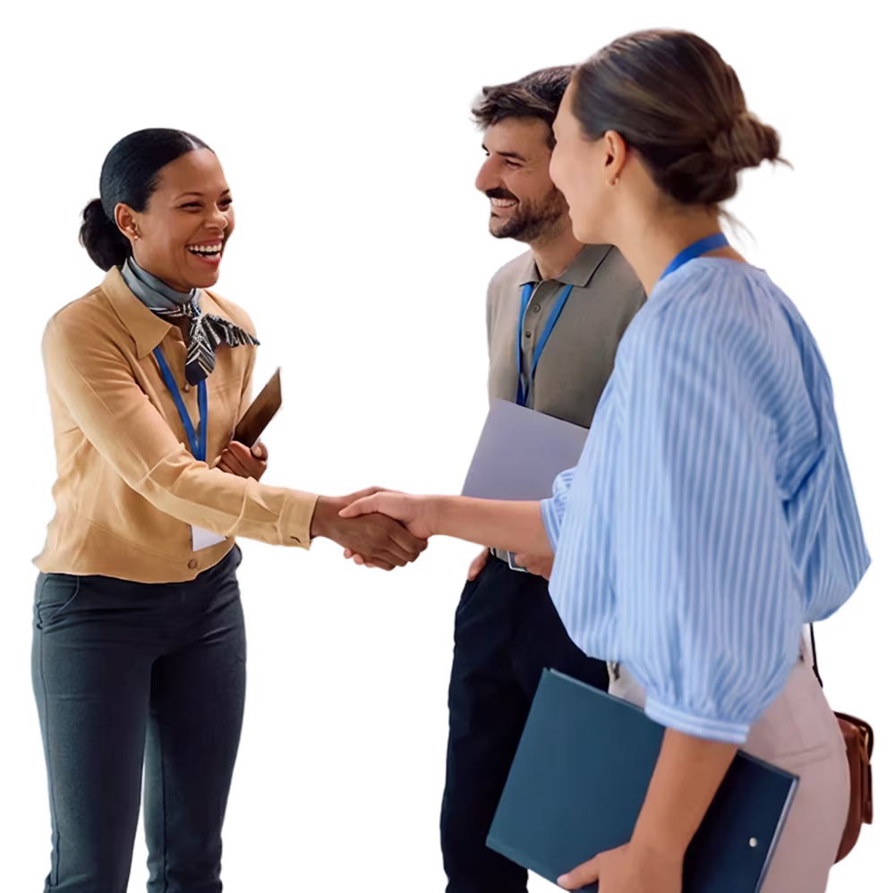 People at an event shaking hands and making introductions